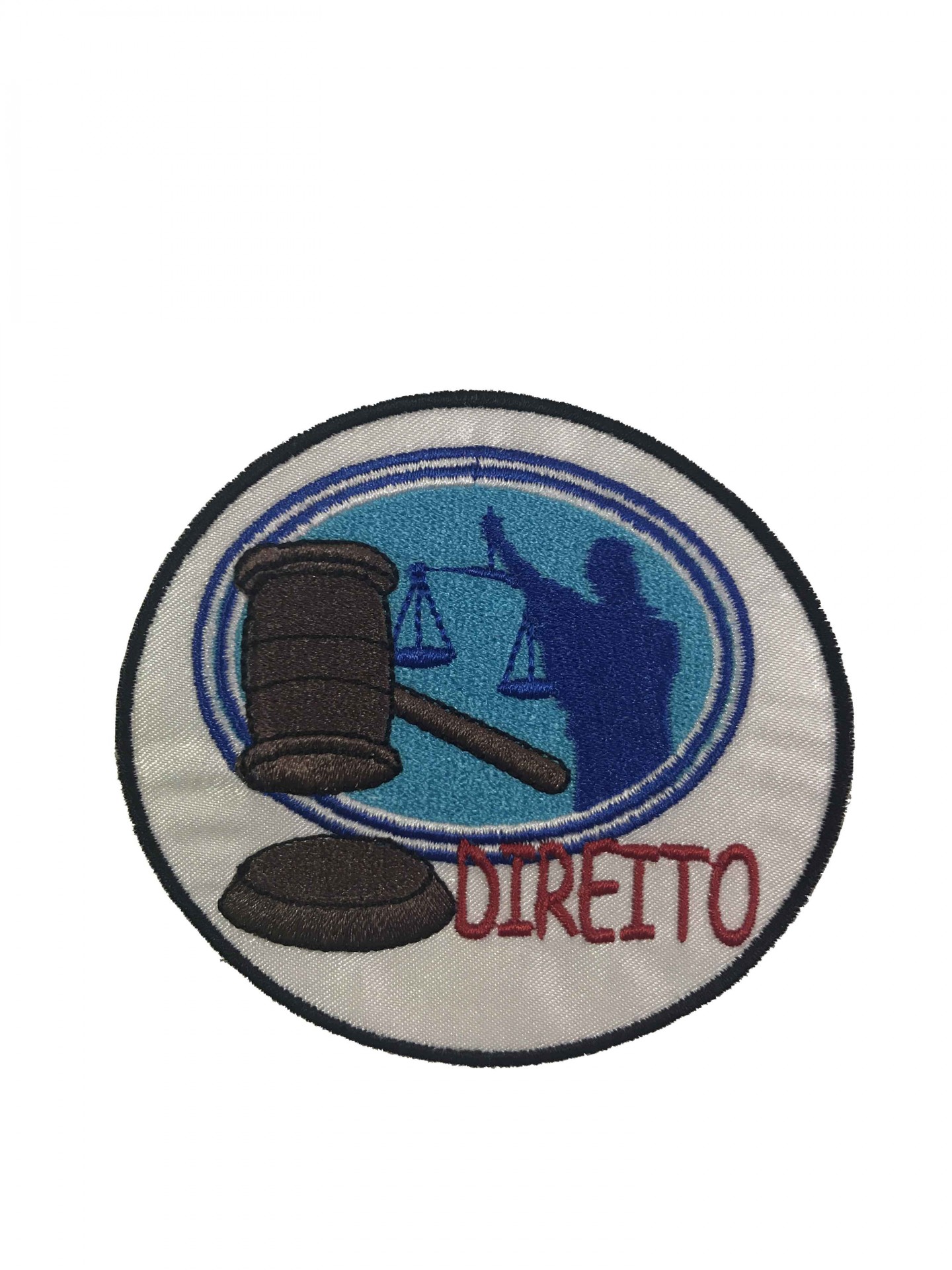Emblema redondo bordado com tema jurídico e a palavra DIREITO