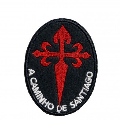 Patch oval preto com cruz vermelha e texto branco A CAMINHO DE SANTIAGO