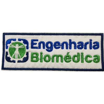 Patch de tecido com texto Engenharia Biomédica e símbolo verde de figura humana