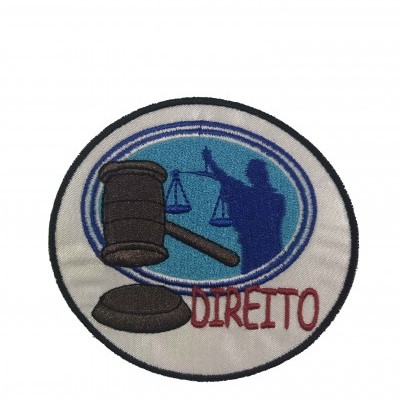 Emblema redondo bordado com tema jurídico e a palavra DIREITO