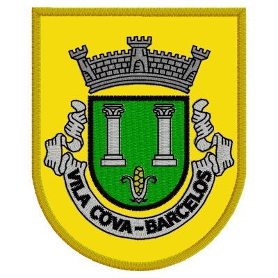 Emblema bordado amarelo com escudo verde, colunas cinza, milho e texto VILA NOVA-BARCELLOS.