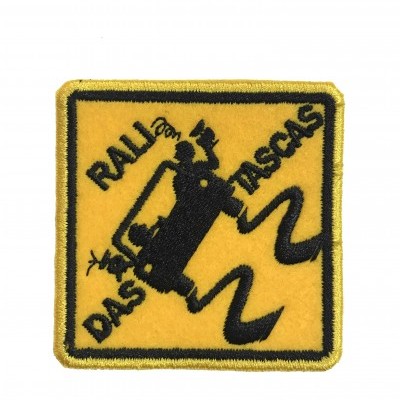 Emblema amarelo e preto com carro e texto 'RALI DAS FISCAS'