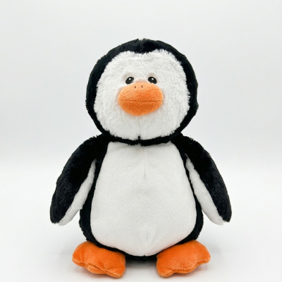 Boneco de pelúcia de pinguim preto, branco e laranja