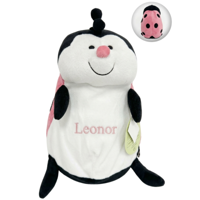Pelúcia joaninha branca, preta e rosa com nome Leonor bordado.