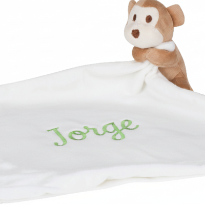 Manta branca macia com boneco de pelúcia e nome Jorge bordado