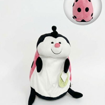 Pelucho de joaninha rosa, branco e preto com pontos pretos e etiqueta verde