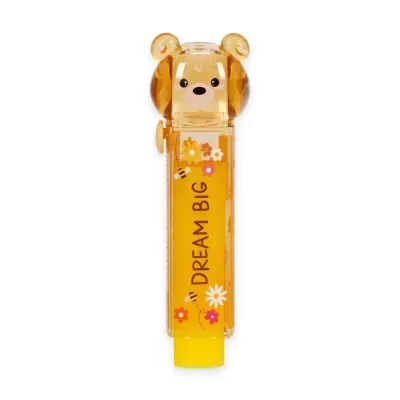 Batom labial amarelo com tampa em forma de cabeça de urso, texto DREAM BIG e decoração floral