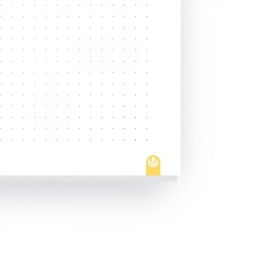 Folha branca com padrão de pontos e símbolo amarelo num canto