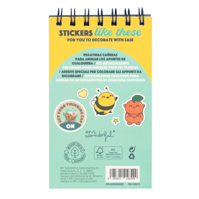 Bloco de papel com autocolantes coloridos e texto em várias línguas