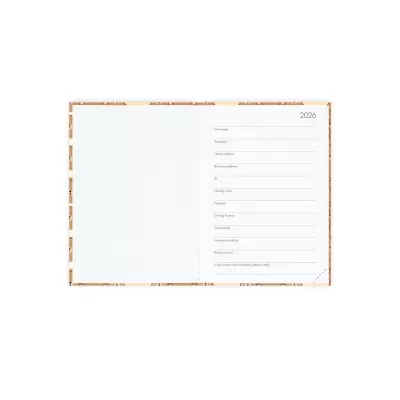 Caderno aberto com campos para preenchimento pessoal e o ano 2026