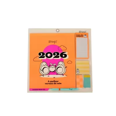 Calendário 2026 laranja com abacates e blocos de notas coloridos e caneta