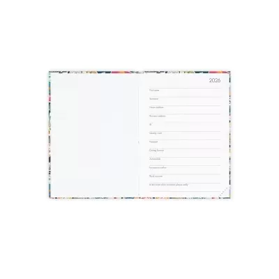 Agenda aberta com campos para preenchimento pessoal e ano 2026