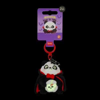 Chaveiro panda vampiro a brilhar embalado em cartão roxo com morcegos