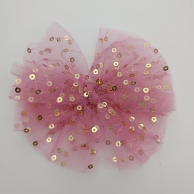 Laço rosa de tule com lantejoulas douradas