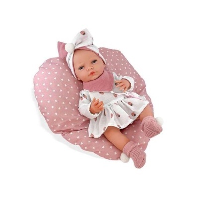 Boneca bebé realista com roupa branca e rosa e almofadão cor-de-rosa com corações