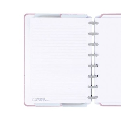 Caderno rosa aberto com páginas pautadas e texto CADERNO INTELIGENTE