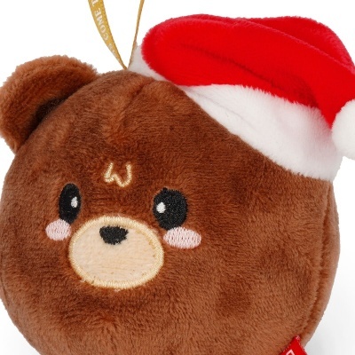 Resguardo castanho de peluche com carinha de urso e chapéu de Natal