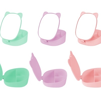 Caixas organizadoras coloridas com tampas espelhadas e orelhas de gato