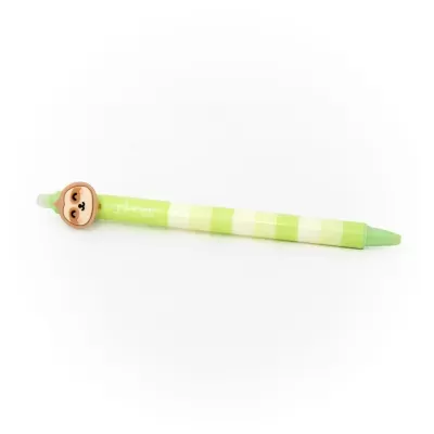 Caneta esferográfica verde com topo decorativo de mola sorridente.