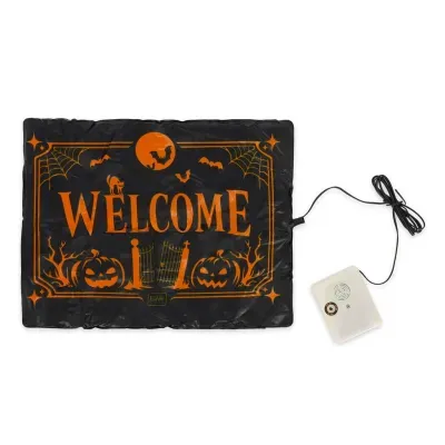 Tapete decorativo de Halloween preto e laranja com palavra WELCOME e dispositivo eletrónico branco