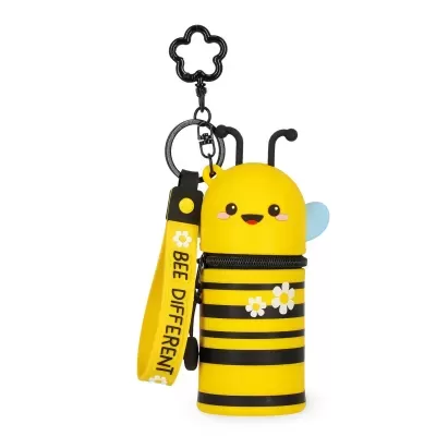 Porta-moedas amarelo em forma de abelha com riscas pretas e fita com texto.