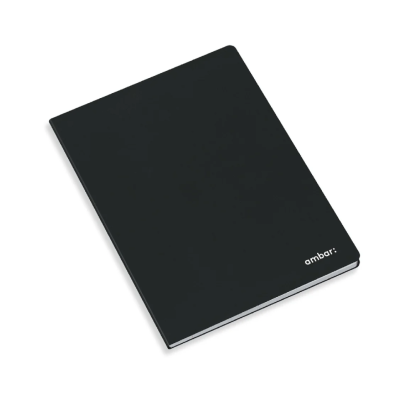 Caderno de capa preta com logo 'ambari'