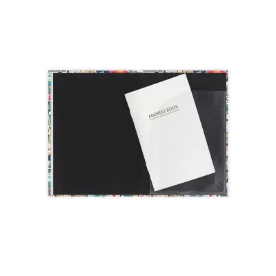 Caixa colorida aberta com livro branco 'ADDRESS BOOK' no interior preto