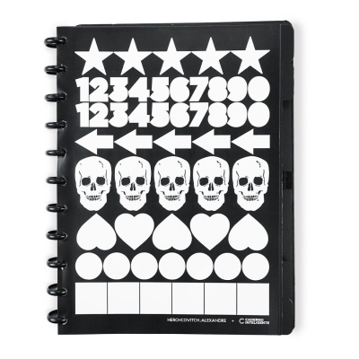 Caderno preto com estampas brancas e texto HERCHCOVITCH; ALEXANDRE + CADERNO INTELIGENTE