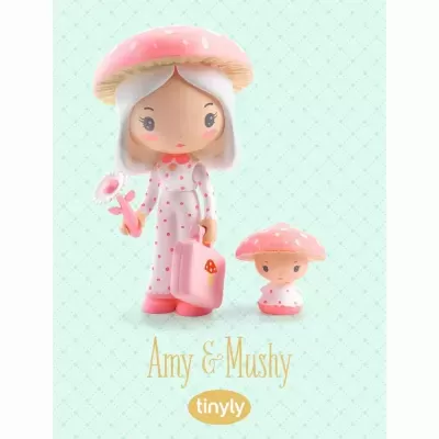 Duas figuras de brinquedo Amy & Mushy com vestidos e chapéus rosa e branco em fundo azul claro
