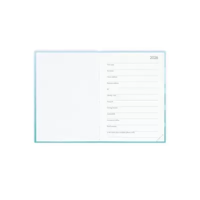 Agenda aberta com espaço para dados pessoais e ano 2026