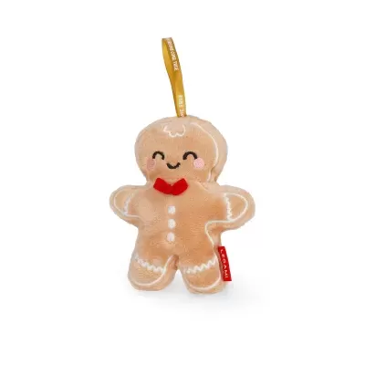 Boneco de peluche biscoito gengibre com laço vermelho e rosto sorridente