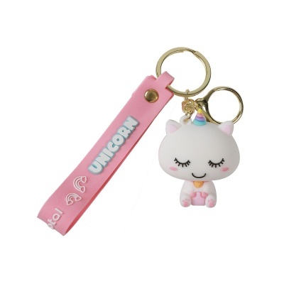 Porta-chaves rosa com chaveiro de unicórnio branco e argolas douradas