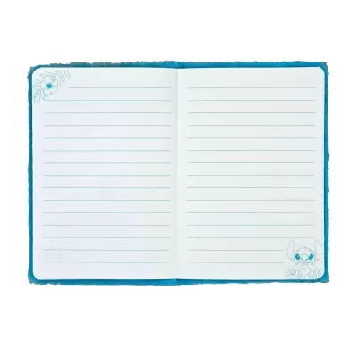 Caderno aberto com desenhos de personagem e flores nas páginas