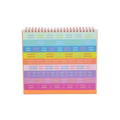 Bloco de notas de mesa colorido com frases impressas.