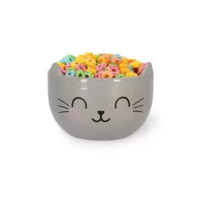 Taça de cerâmica cinzenta com rosto de gato preenchida com cereais coloridos
