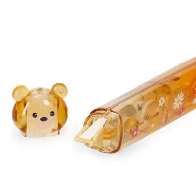 Corrector líquido com tampa em cabeça de urso e corpo transparente com flores