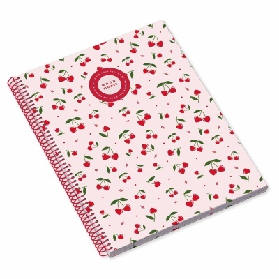 Caderno espiral rosa claro com padrão de cerejas vermelhas e selo vermelho com texto MOODS & MODES.