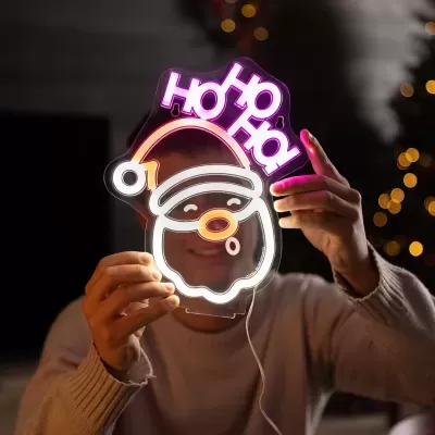 Placa luminosa LED Pai Natal com texto 'Ho Ho Ho' em rosa