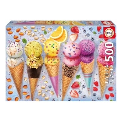 Caixa de puzzle com cones de gelado coloridos e frutos espalhados