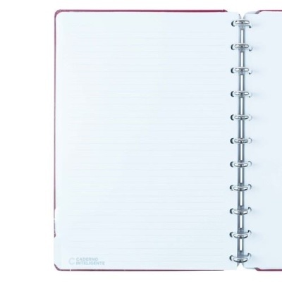 Caderno de argolas com capa vermelha e página pautada branca