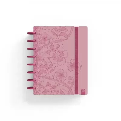 Caderno rosa com padrão floral e elástico cor de rosa
