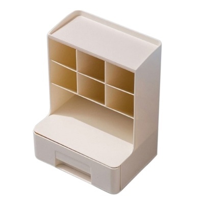 Organizador de secretária em plástico bege com vários compartimentos e gaveta.