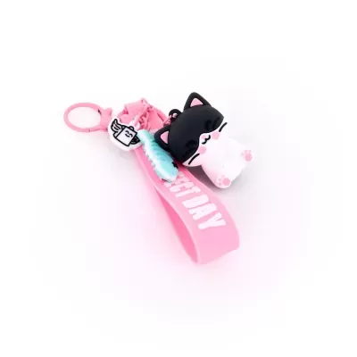 Porta-chaves rosa com chaveiro de gato, peixe e pão com asas