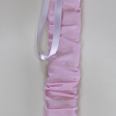 Prendedor de chucha rosa com fita branca e fecho de plástico