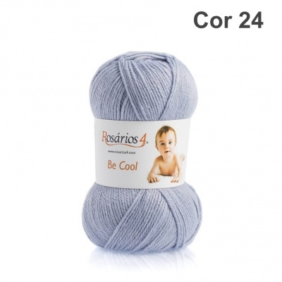 novelo de lã cinzento claro com rótulo branco e imagem de bebé