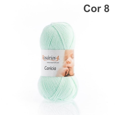 Novelo de lã verde claro Rosários 4 Carícia com rótulo branco e imagem de bebé