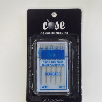 Embalagem preta com agulhas de máquina de costura com base azul