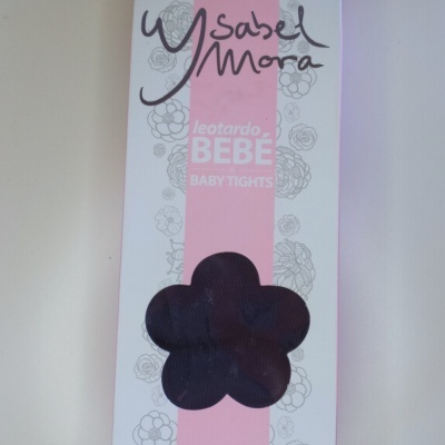 Embala de collants para bebé com marca Ysabel Mora em cores branco e rosa