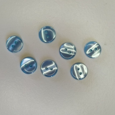 Botões redondos azuis translúcidos com dois orifícios