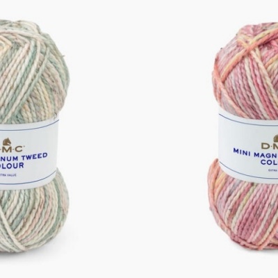 quatro novelos de lã colorida com etiquetas DMC COCOON